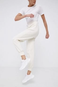 Γυναικεία Παντελόνια φόρμας Παντελόνι Adidas Performance χρώμα: κρεμ