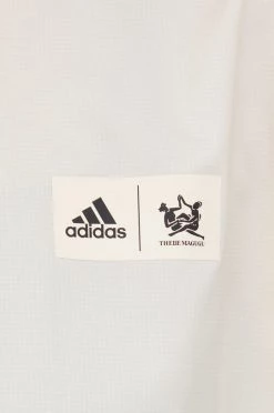 Γυναικεία Κοντά μπουφάν Αντιανεμικό Adidas Performance Thebe Magugu μπεζ -Συμφωνίεςa didas Performance Κατάστημα unnamed file 157